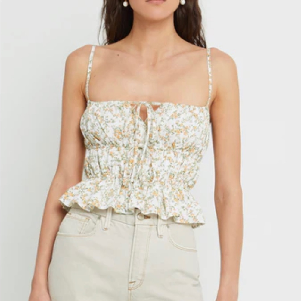 Kourt floral top. New with tags. Size small